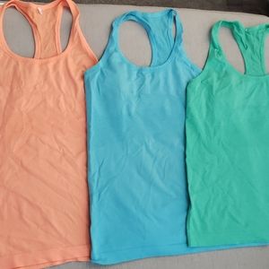 3 swiftly tanks 2 size 10, 1 size 8